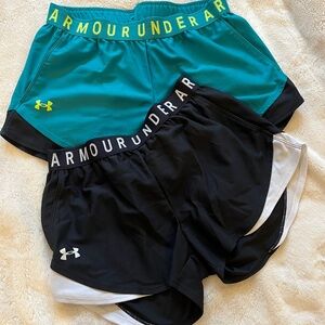 Under Armour running shorts - size M - two pair